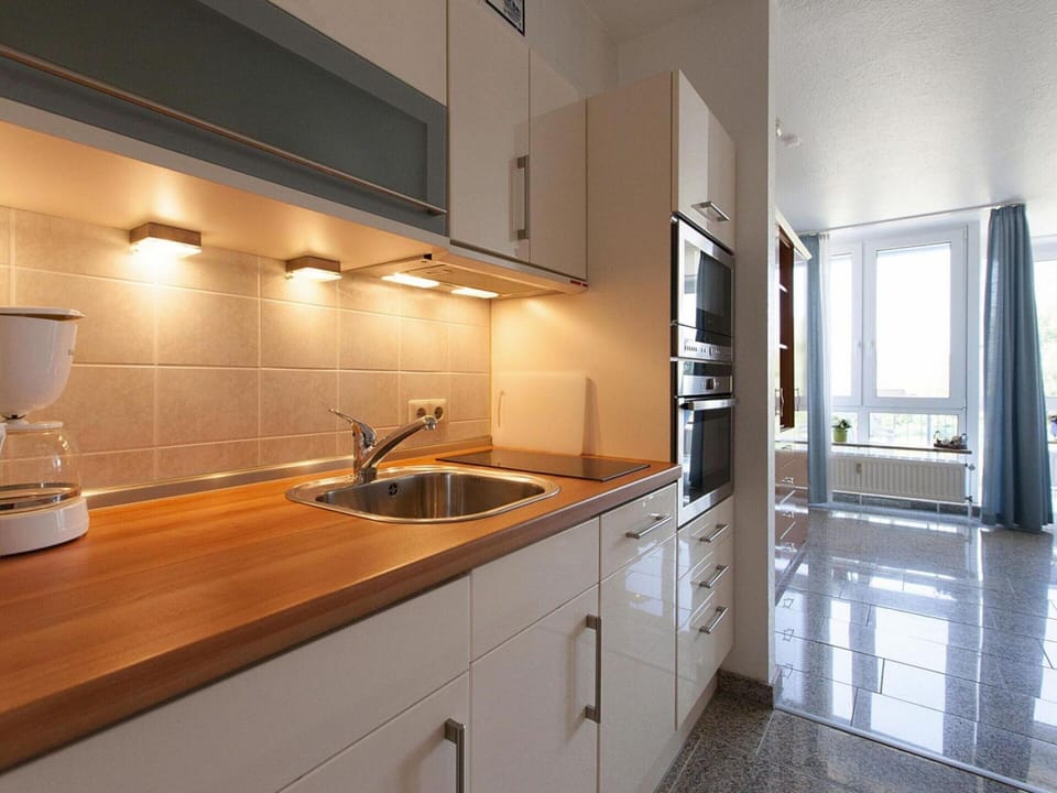 Apartment | Private kitchen | Electric kettle, toaster, highchair