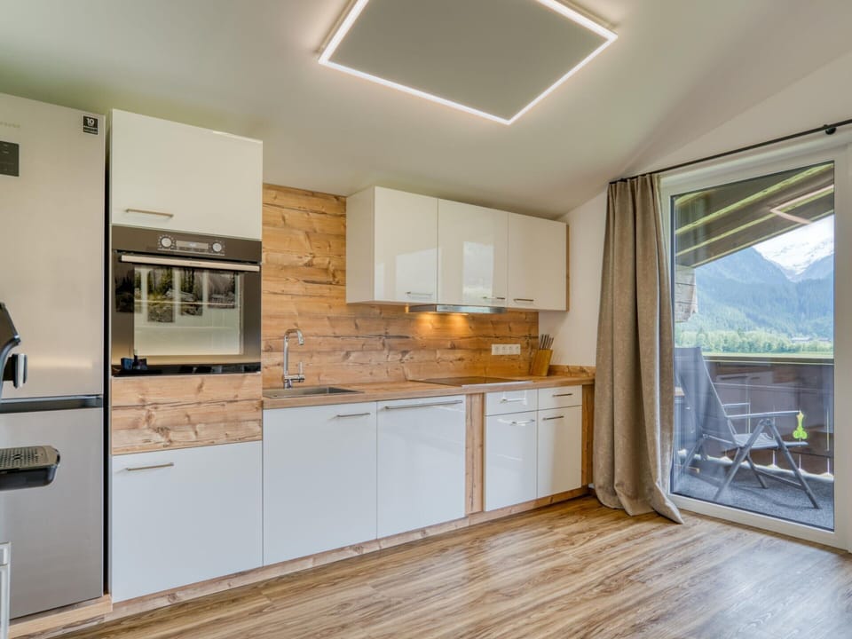Apartment | Private kitchen | Electric kettle, highchair