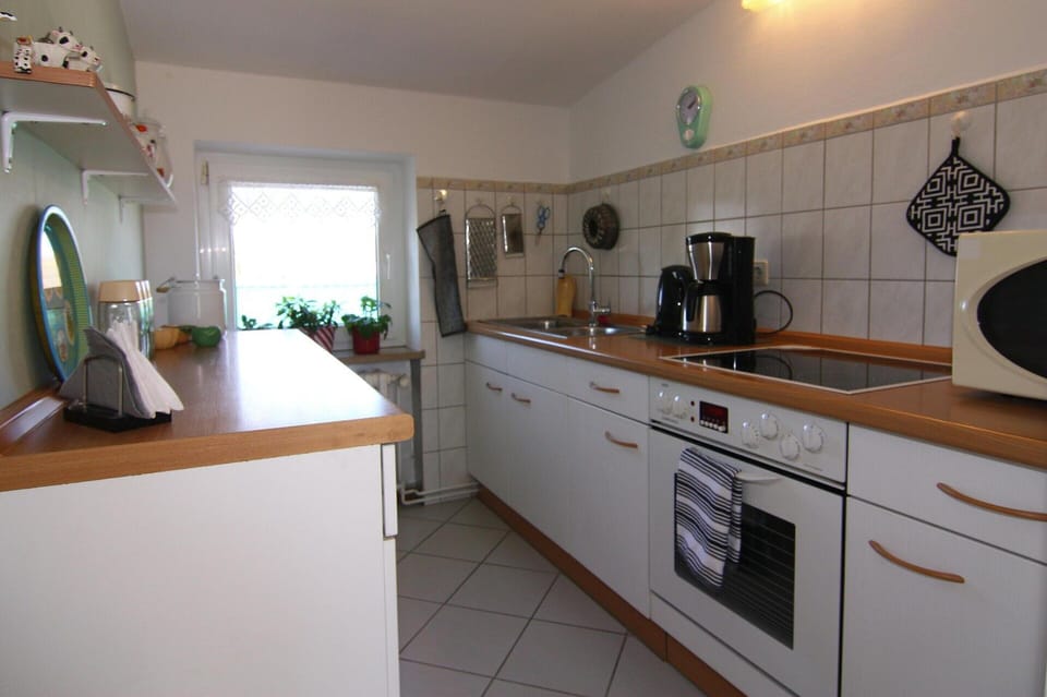 Apartment | Private kitchen | Electric kettle, toaster, highchair