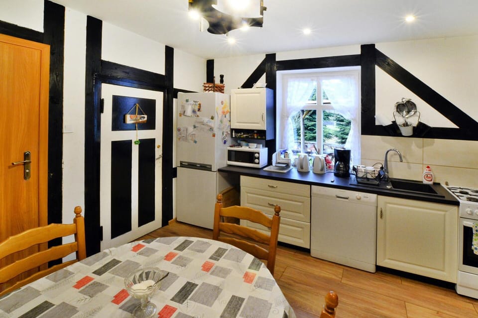 Villa | Private kitchen | Electric kettle, highchair