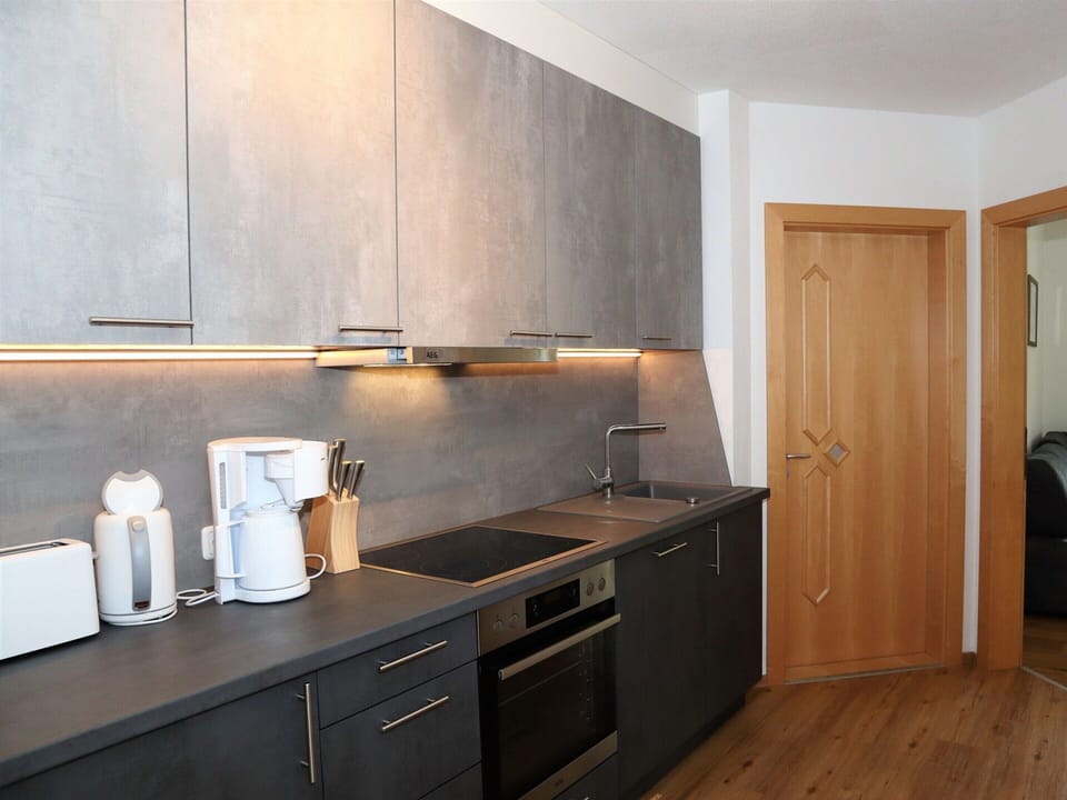 Apartment | Private kitchen | Electric kettle, highchair