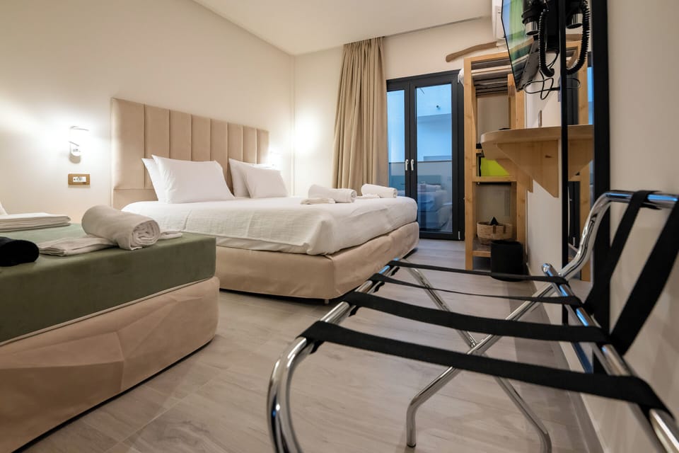 Superior Double Room, Balcony, City View | Living area | TV