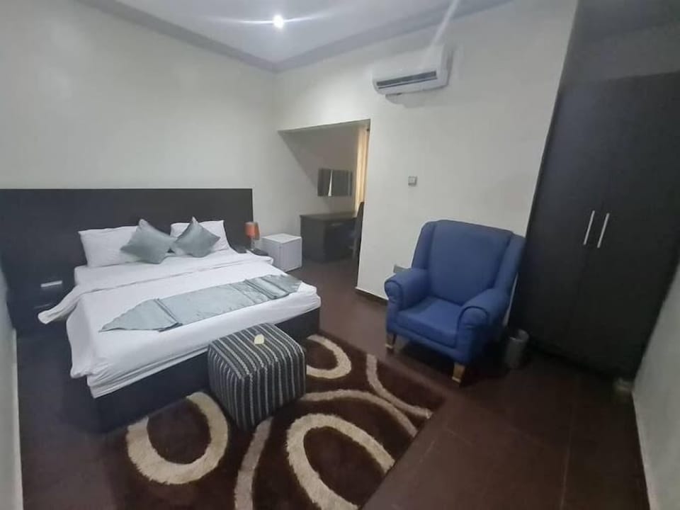 Family Room, Balcony, City View | Desk, laptop workspace, free WiFi