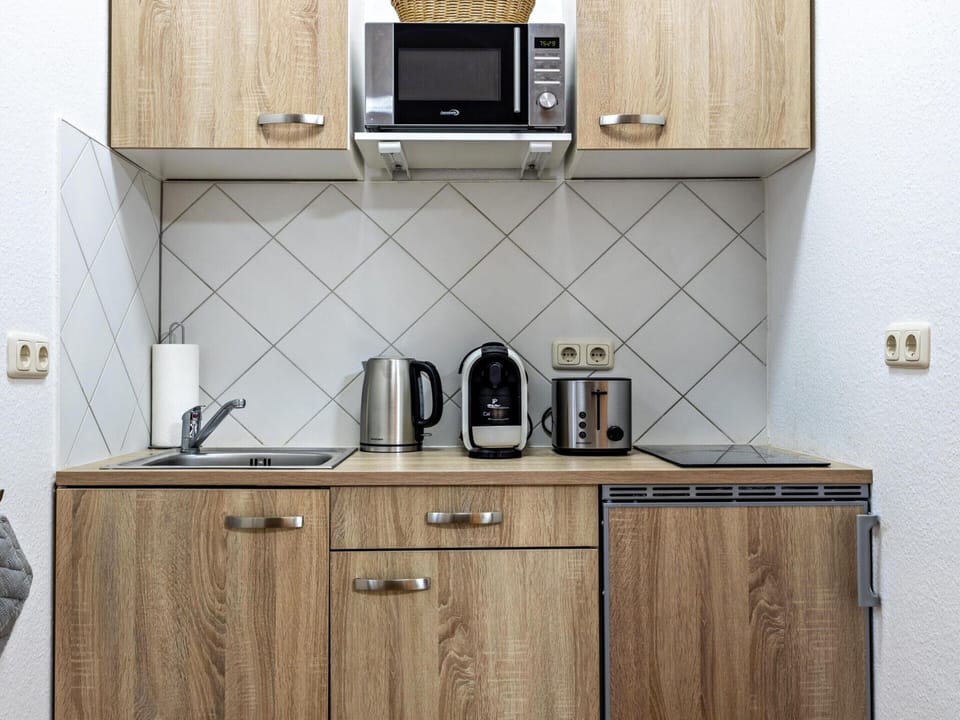 Apartment | Private kitchen | Electric kettle, toaster, highchair