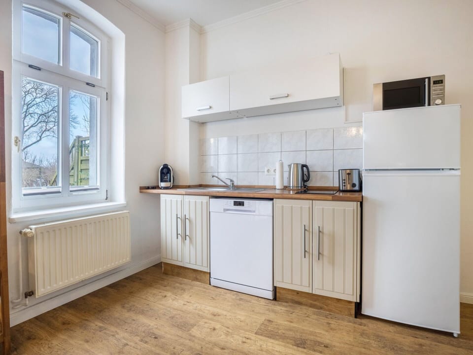 Apartment | Private kitchen | Electric kettle, toaster, highchair