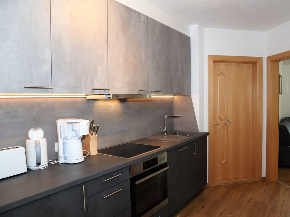 Apartment | Private kitchen | Electric kettle, highchair