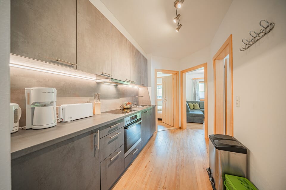 Apartment | Private kitchen | Electric kettle, highchair