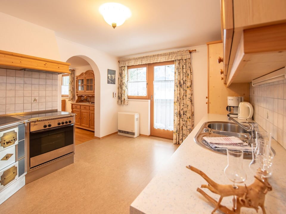 Apartment | Private kitchen | Stovetop, electric kettle, toaster