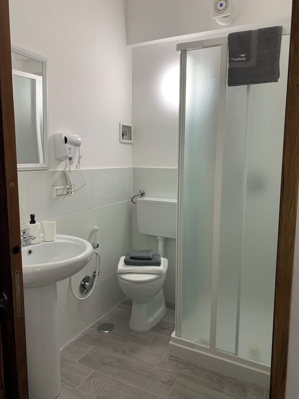 Classic Twin Room, Private Bathroom | Bathroom | Shower, hair dryer, slippers, towels