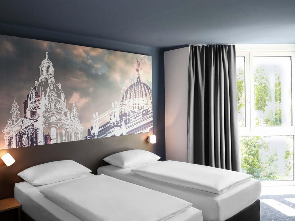 Blackout drapes, soundproofing, free WiFi, bed sheets