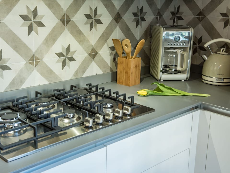 Apartment | Private kitchenette | Full-size fridge, microwave, stovetop, dishwasher