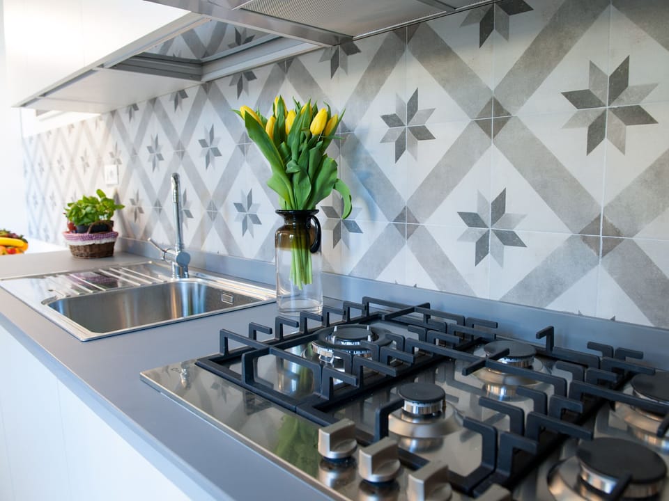 Apartment | Private kitchenette | Full-size fridge, microwave, stovetop, dishwasher