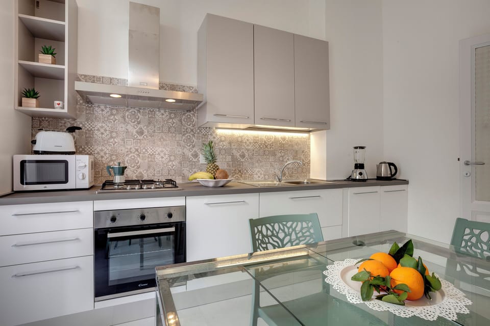 Apartment | Private kitchen | Full-size fridge, microwave, oven, stovetop