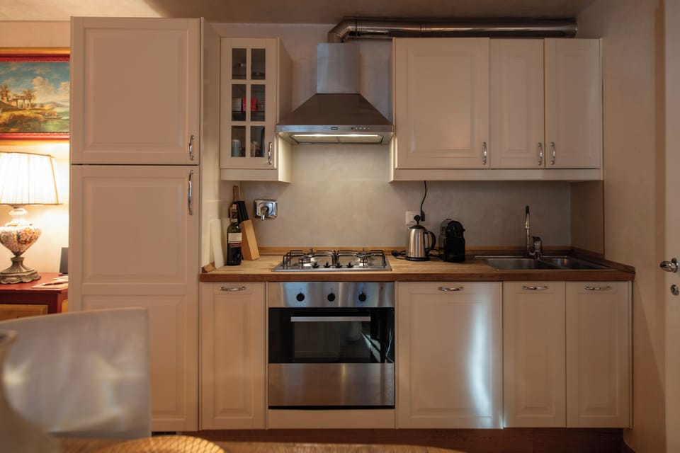 Apartment | Private kitchenette | Full-size fridge, microwave, oven, stovetop
