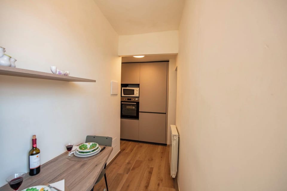 Apartment | Private kitchenette | Full-size fridge, microwave, oven, stovetop