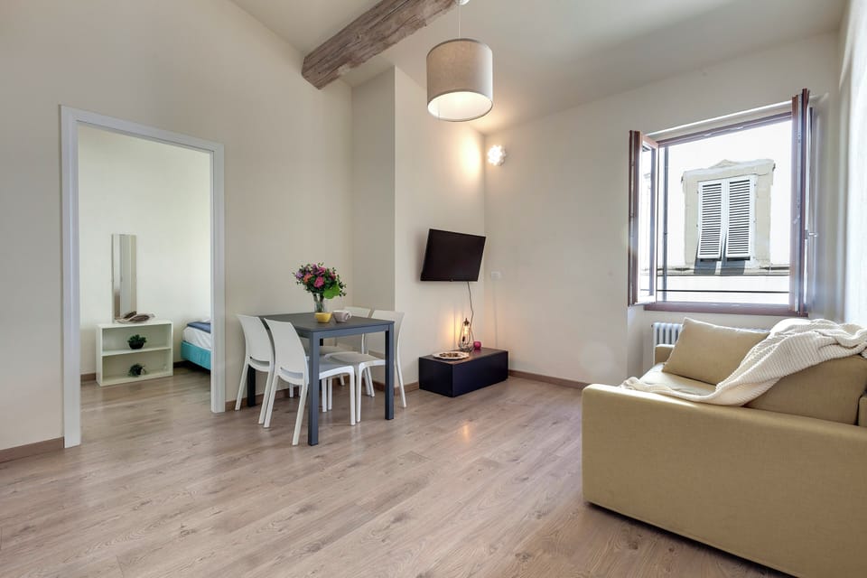 Apartment | Living area | 24-inch flat-screen TV with digital channels