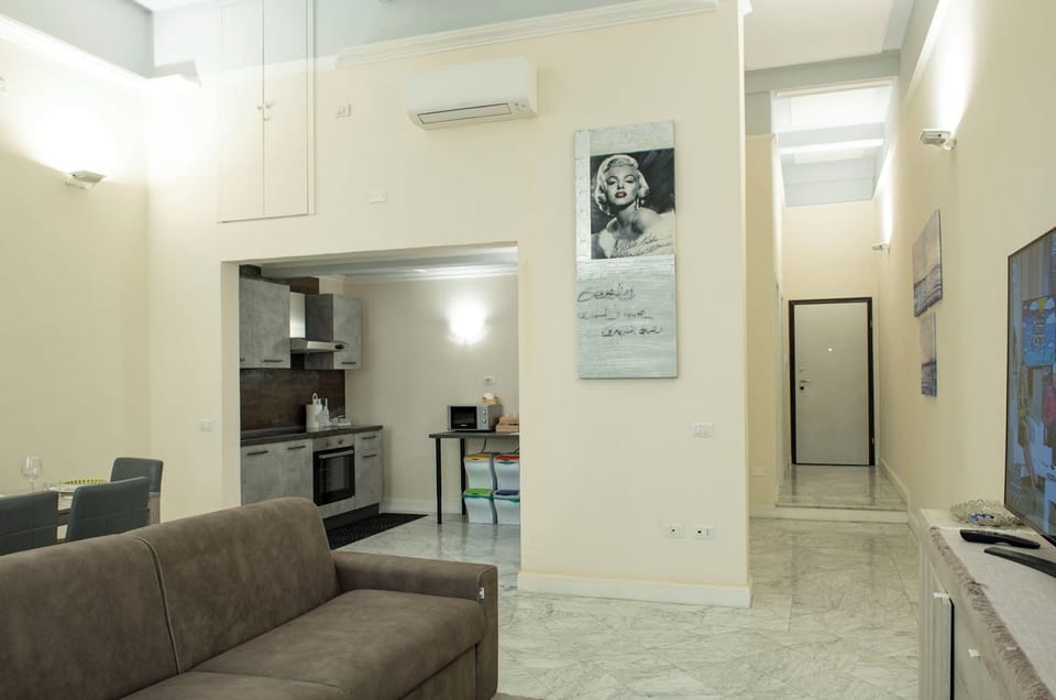 Apartment | Living area | 24-inch flat-screen TV with digital channels