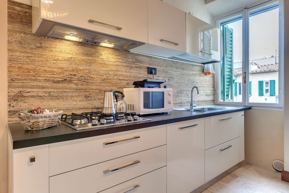 Apartment | Private kitchenette | Full-size fridge, microwave, stovetop, dishwasher