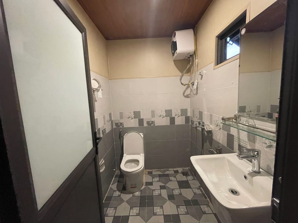 Shower, hair dryer, slippers, towels