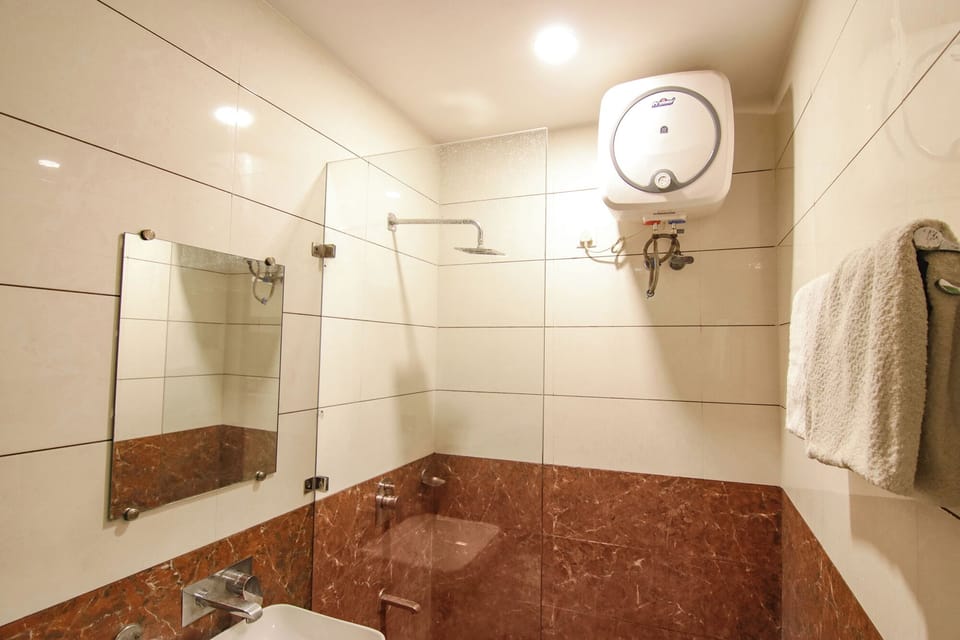 Shower, free toiletries, towels, soap