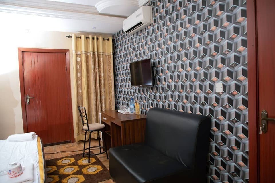 Family Room, Balcony, City View | Desk, laptop workspace, free WiFi