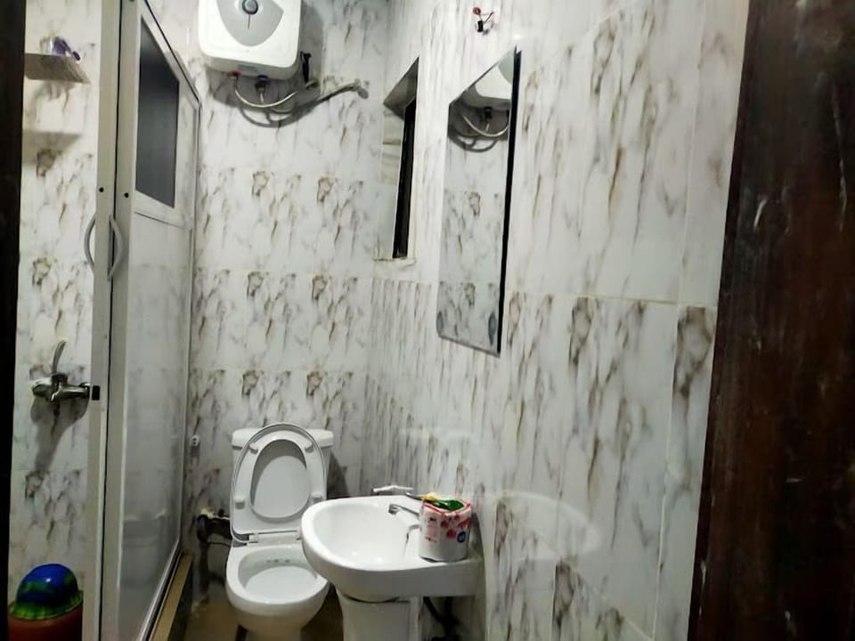 Family Room, Balcony, City View | Bathroom | Free toiletries, towels, soap, shampoo