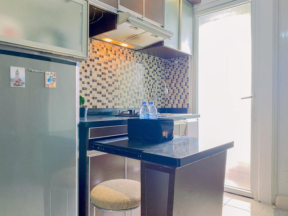 Apartment | Private kitchen | Fridge, stovetop, rice cooker, dining tables