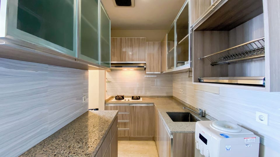 Apartment | Private kitchen | Fridge, stovetop, rice cooker, dining tables