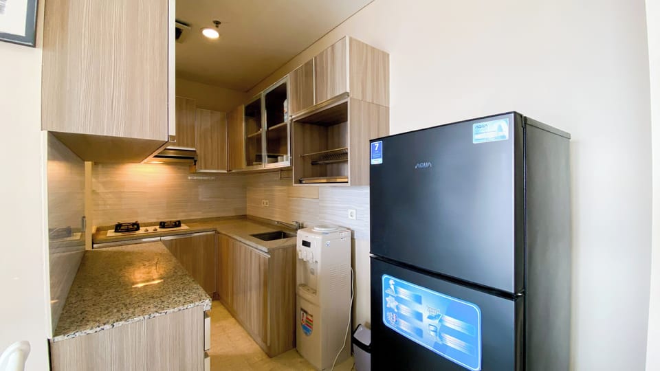 Apartment | Private kitchen | Fridge, stovetop, rice cooker, dining tables