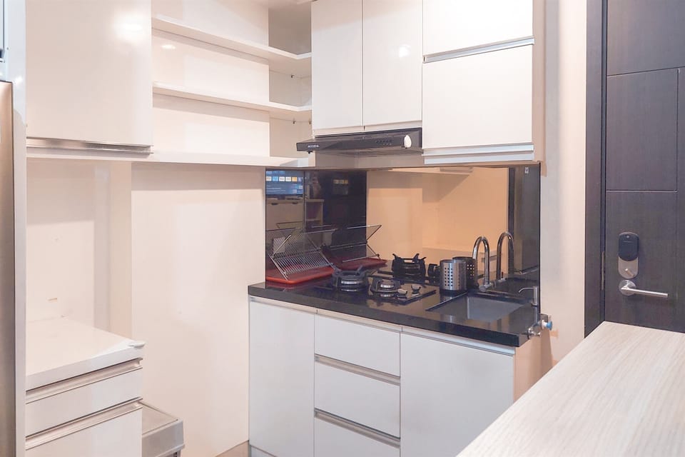 Apartment | Private kitchen | Fridge, stovetop, rice cooker, dining tables