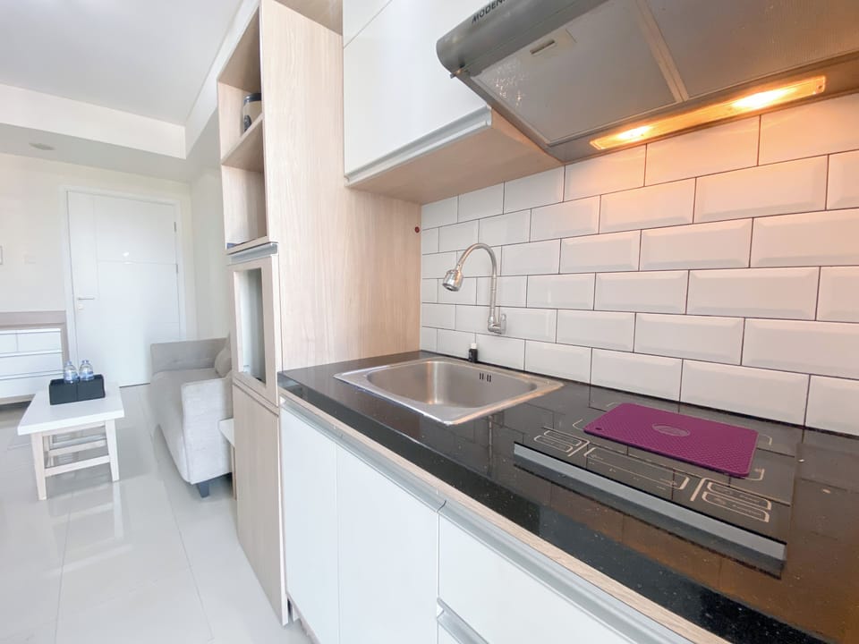 Apartment | Private kitchen | Fridge, stovetop, rice cooker, dining tables