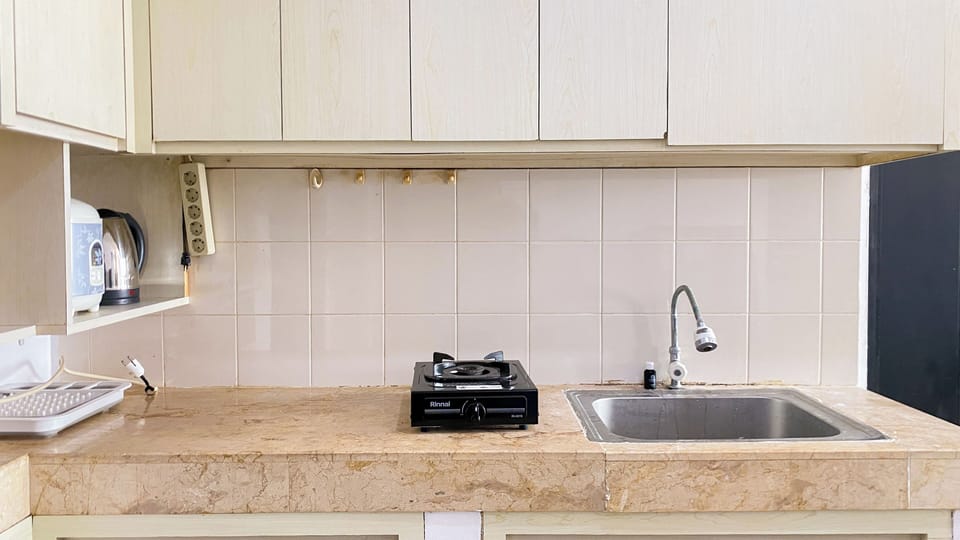 Apartment | Private kitchen | Fridge, stovetop, rice cooker, dining tables