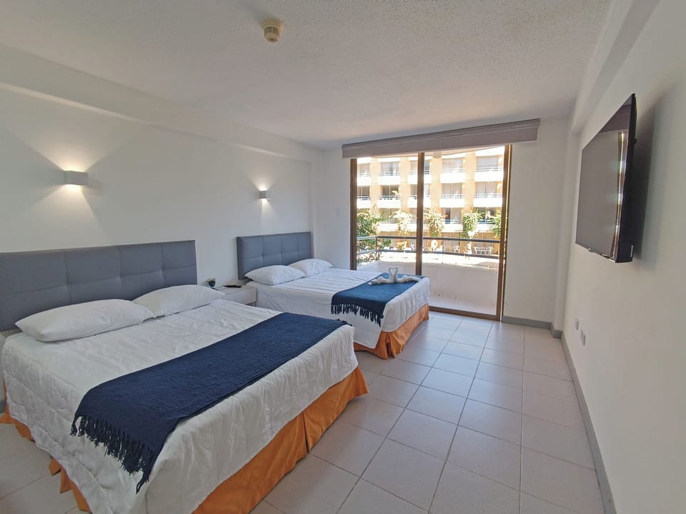 Standard Room, Balcony, Pool View | In-room safe, blackout drapes, soundproofing