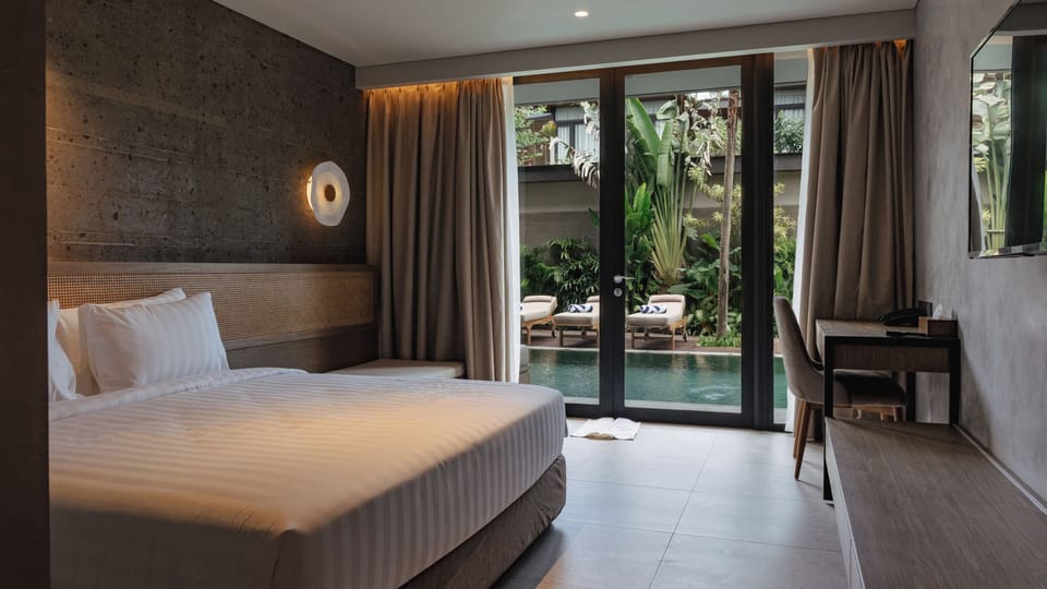 Deluxe Room Pool Access | Minibar, in-room safe, desk, blackout drapes