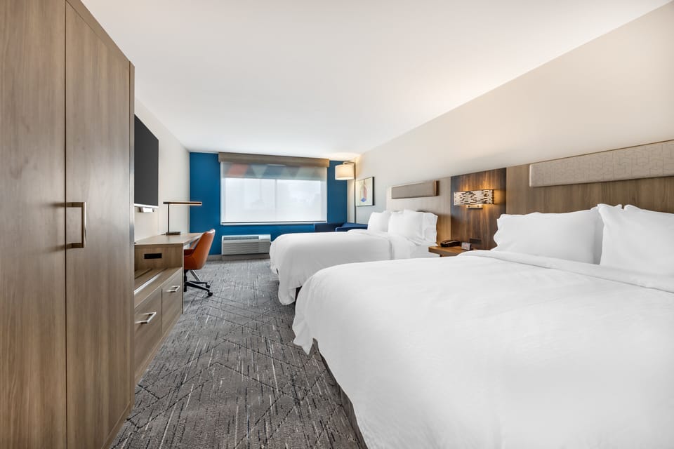 Suite, 2 Queen Beds | In-room safe, laptop workspace, blackout drapes, soundproofing
