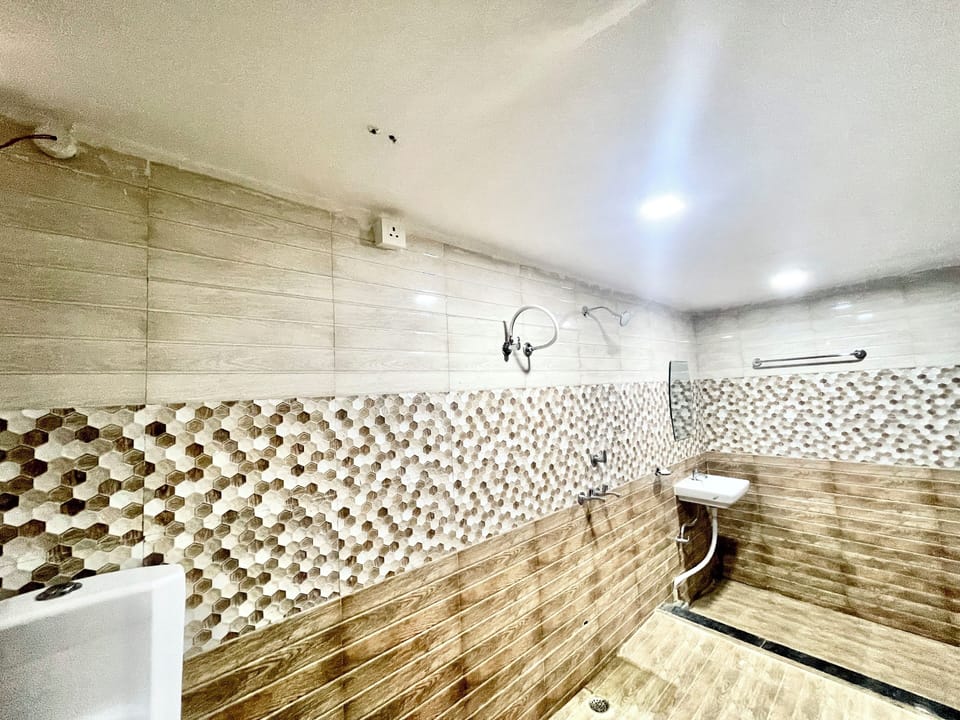 Shower, rainfall showerhead, towels, soap