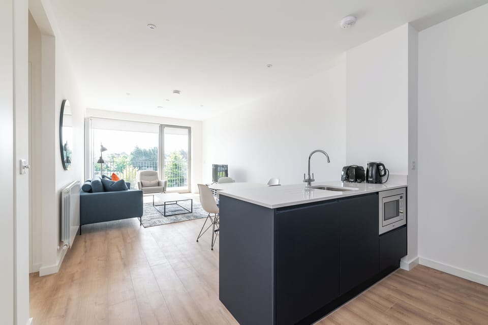 Deluxe Apartment, Balcony | Living area | TV