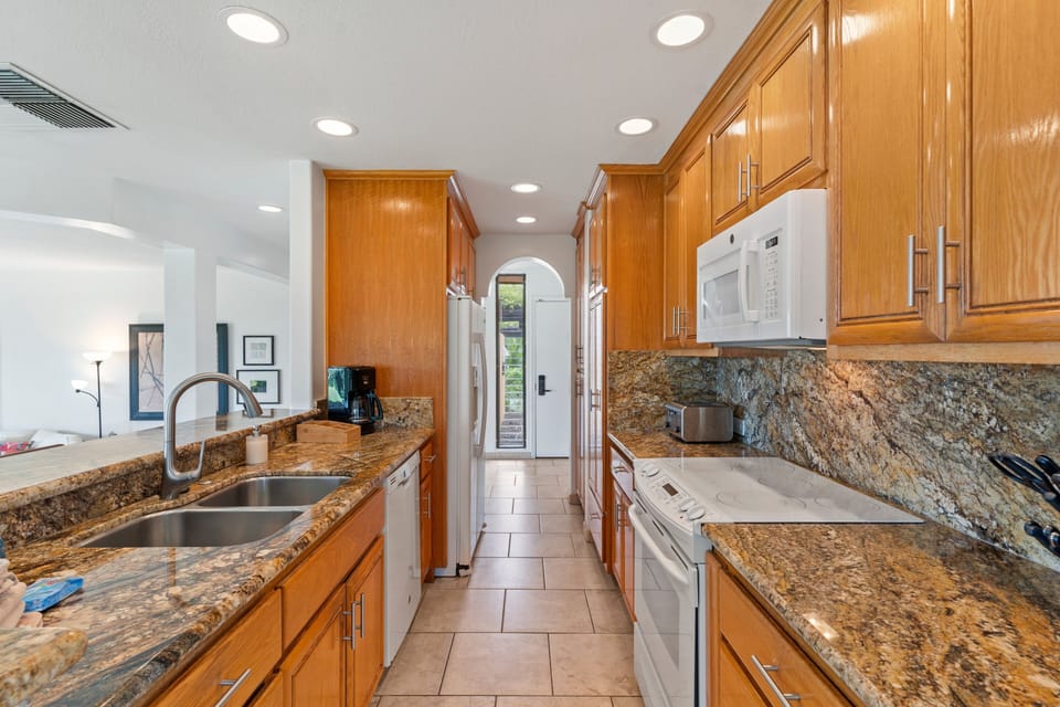 Condo, 2 Bedrooms | Private kitchen | Coffee/tea maker, fridge, oven, toaster