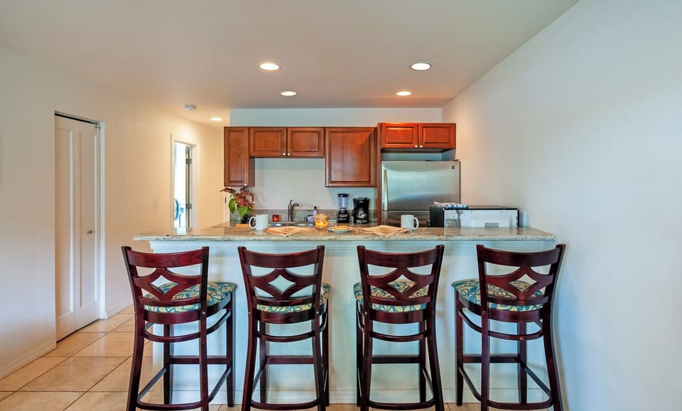 Condo, 1 King Bed with Sofa bed, Balcony, Pool View (218) | Private kitchen | Coffee/tea maker