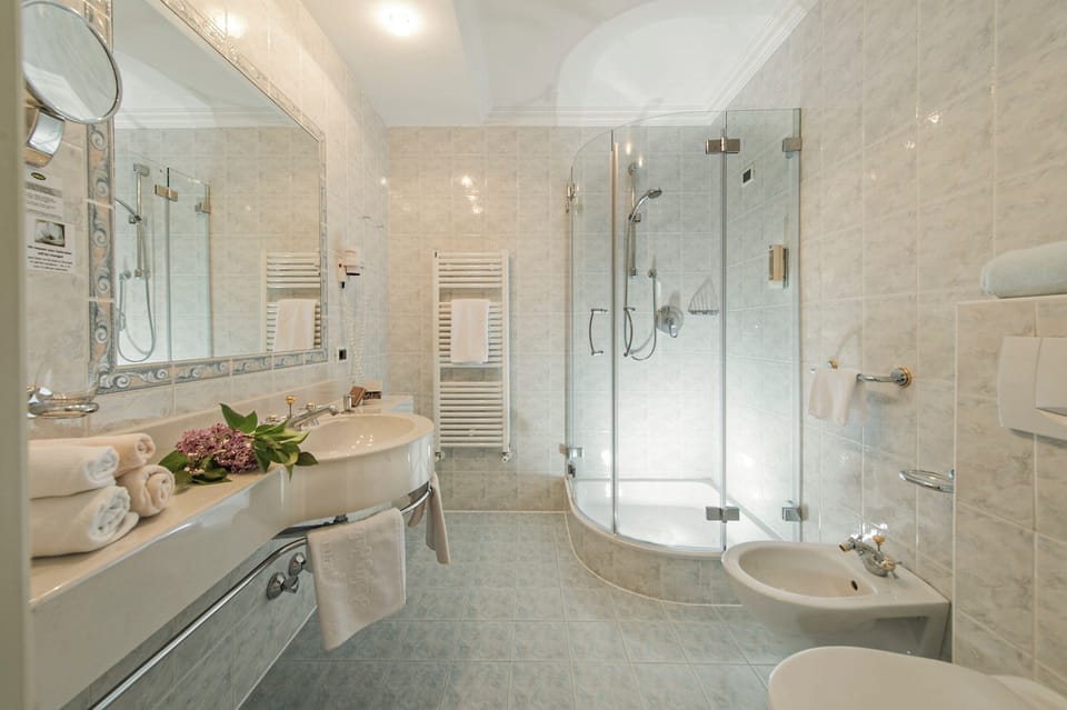 Hair dryer, bathrobes, slippers, bidet