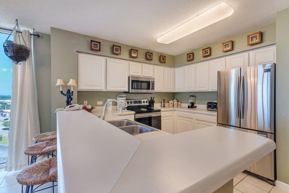 Condo, 3 Bedrooms | Private kitchen | Coffee/tea maker, fridge, toaster, cookware/dishes/utensils