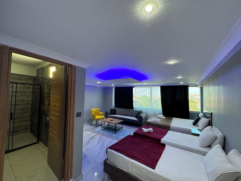 Deluxe Suite | Premium bedding, desk, laptop workspace, soundproofing