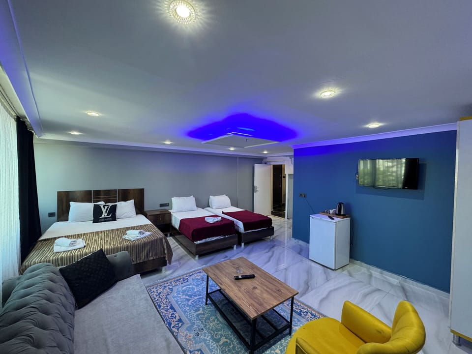 Deluxe Suite | Premium bedding, desk, laptop workspace, soundproofing