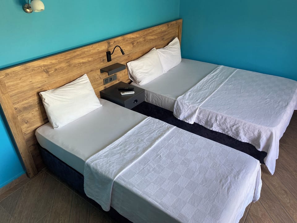 Standard Triple Room | Laptop workspace, soundproofing, free WiFi