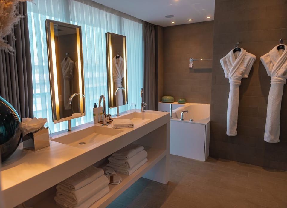 Luxury Penthouse, 1 King Bed with Sofa bed | Bathroom | Rainfall showerhead, eco-friendly toiletries, hair dryer, bathrobes