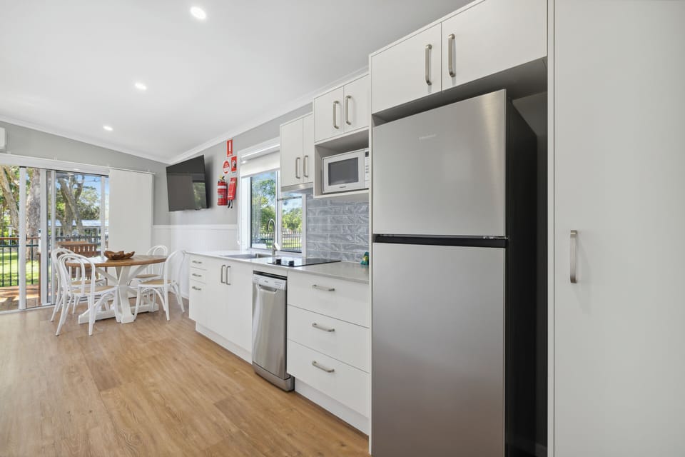 Superior 2 Bedroom Cabin | Private kitchen | Microwave, stovetop, toaster, cookware/dishes/utensils