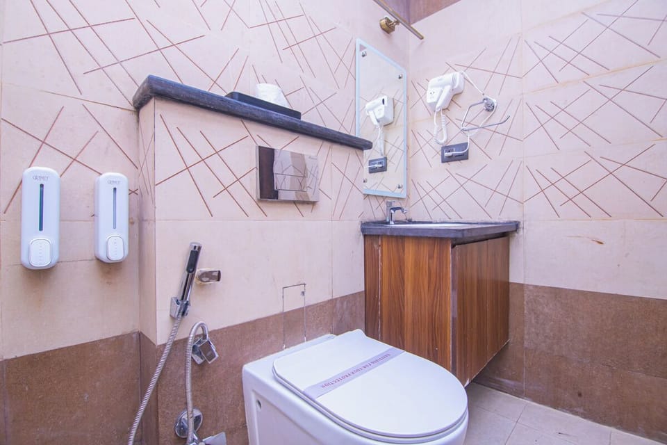 Shower, free toiletries, hair dryer, slippers