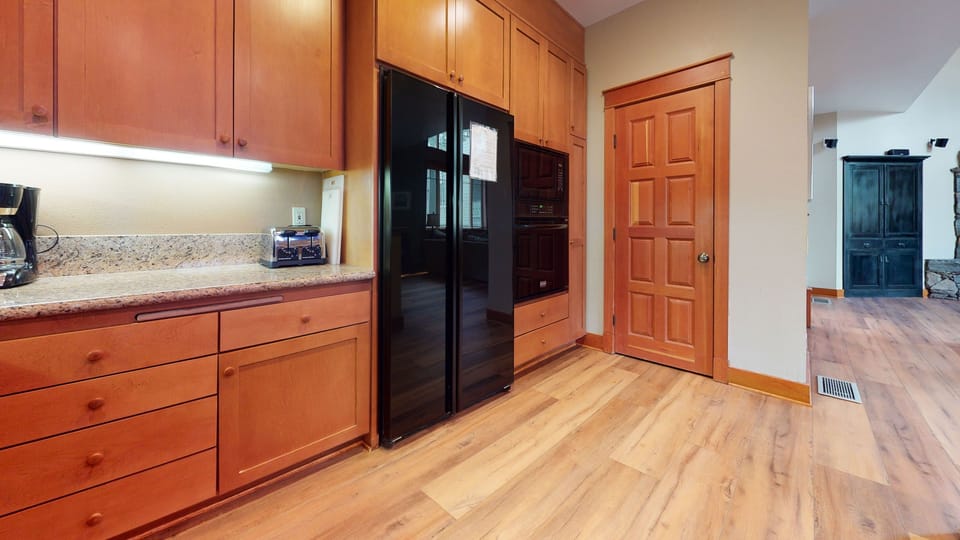 Townhome, 4 Bedrooms | Private kitchen | Fridge, oven, coffee/tea maker, toaster