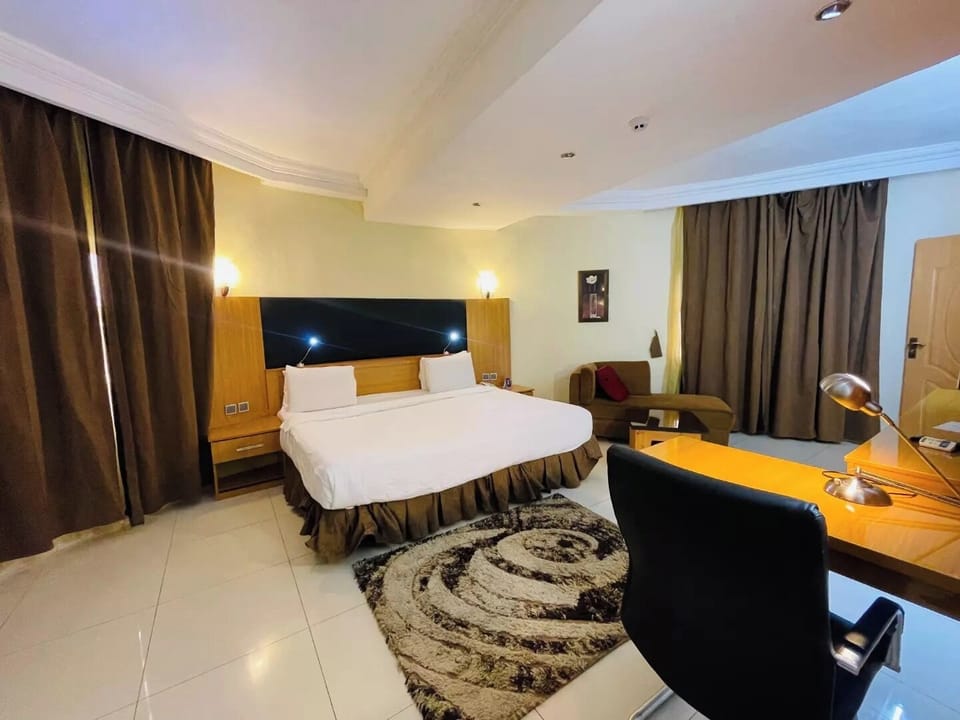 Comfort Room, Balcony, City View | Desk, laptop workspace, free WiFi