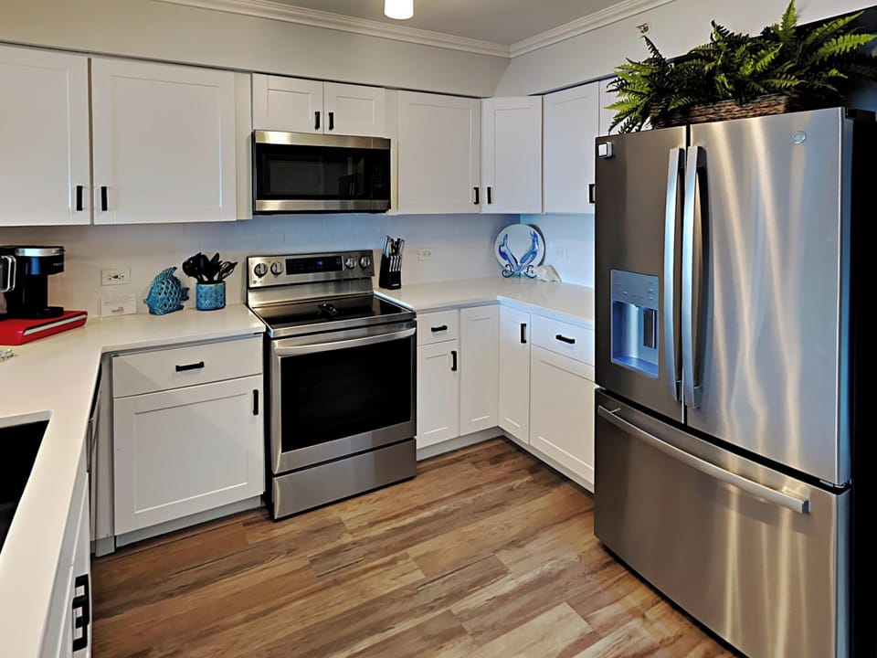 Condo, Multiple Beds, Balcony, Ocean View (Terrace at Pelican Beach #703) | Private kitchen | Microwave, oven, stovetop, dishwasher